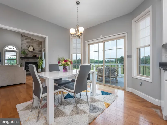a view of entryway with stairs and wooden floor