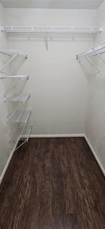 a view of a room with racks on the wall