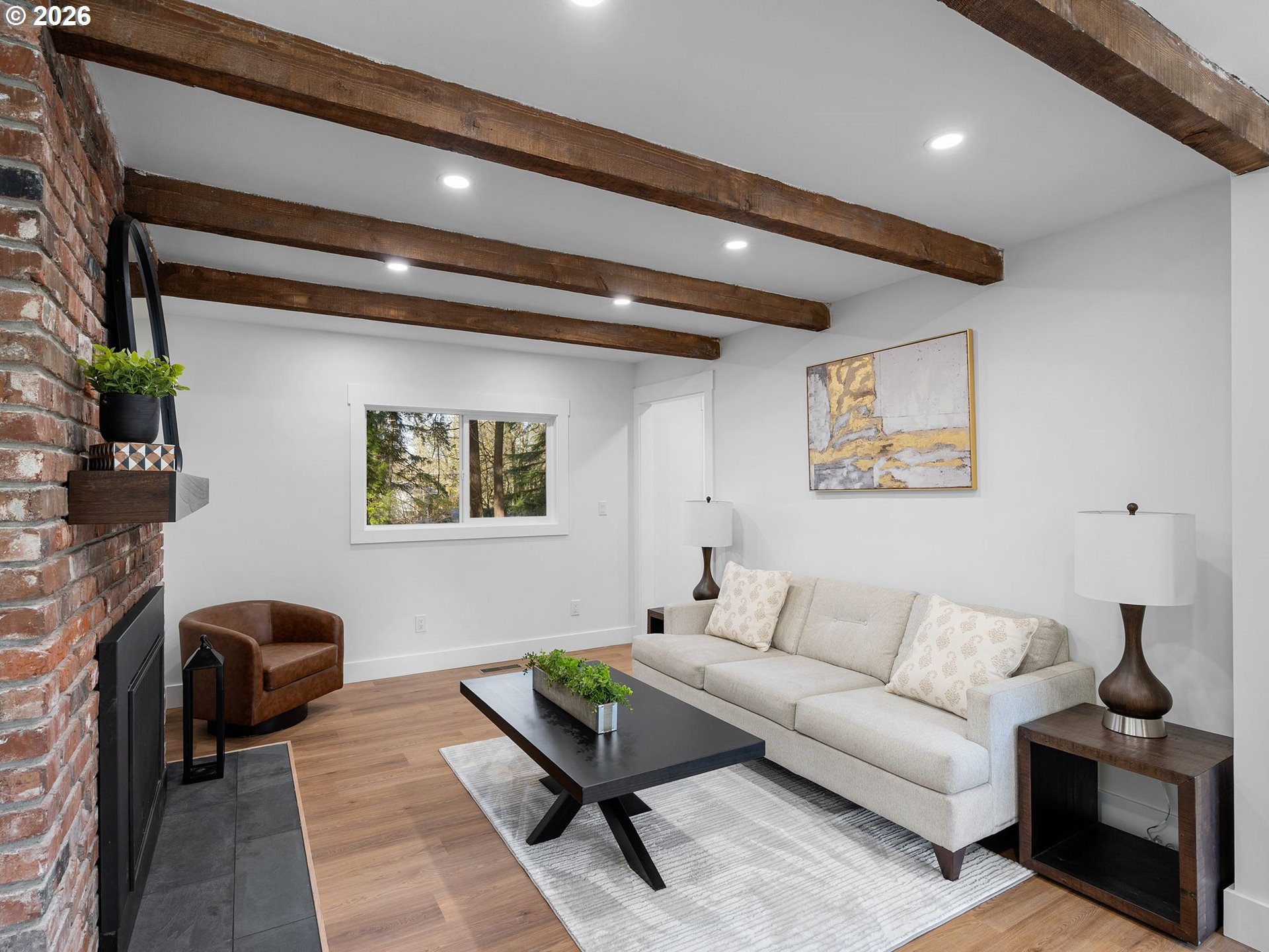 20270 Southwest Jaylee Street Beaverton, OR 97078 - Photo 16 of 40 a living room with furniture and a potted plant