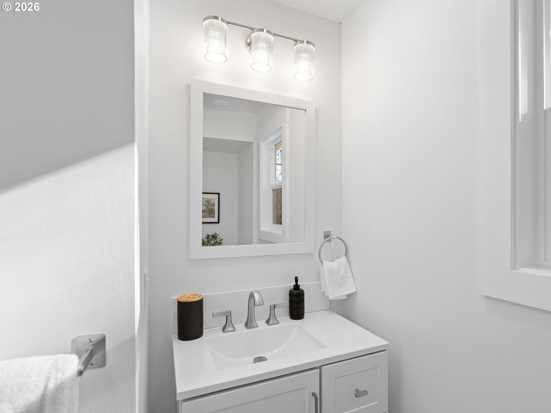 20270 Southwest Jaylee Street Beaverton, OR 97078 - Photo 18 of 40 a bathroom with a sink and a mirror