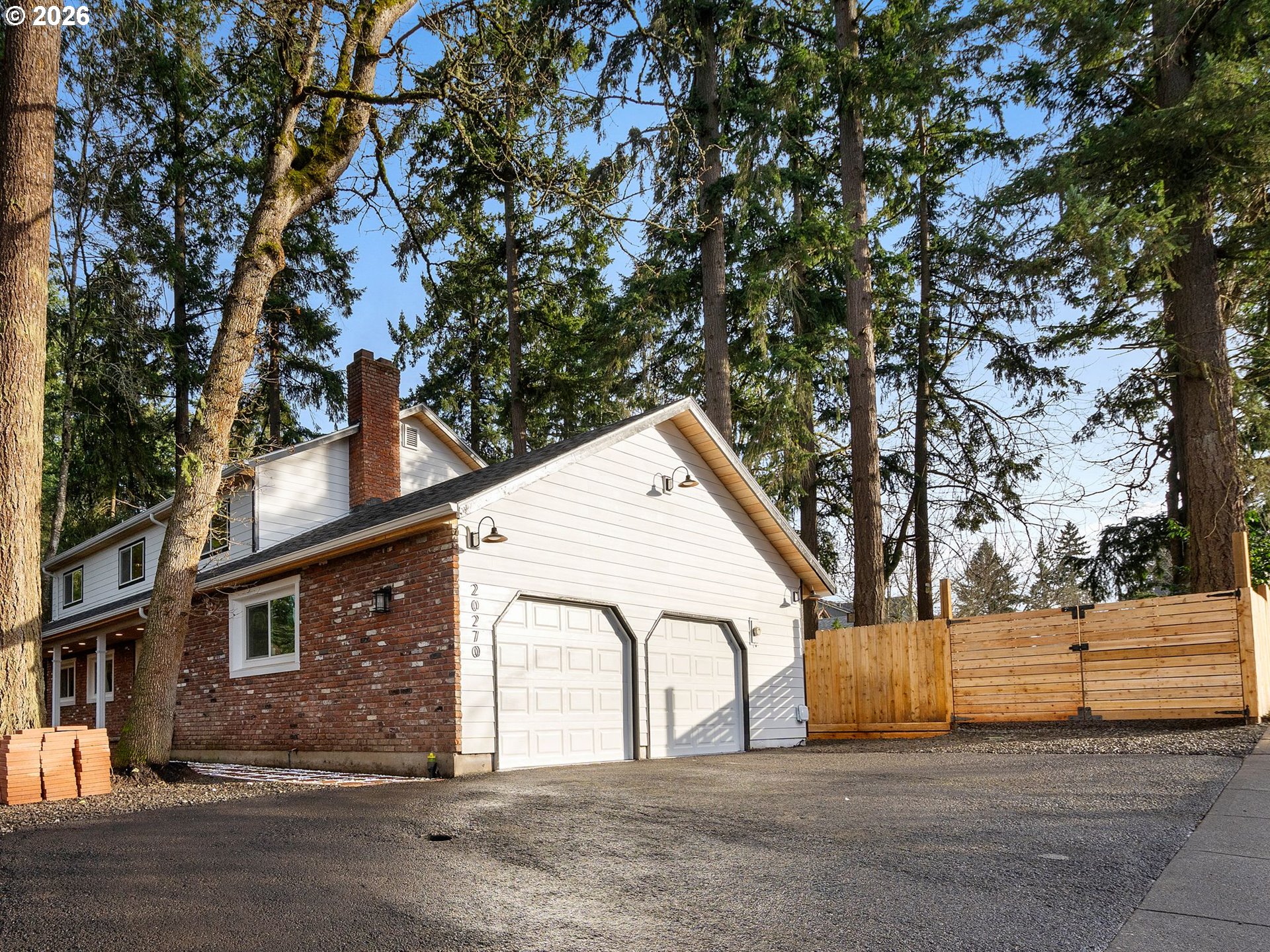 20270 Southwest Jaylee Street Beaverton, OR 97078 - Photo 37 of 40 a view of a house with a tree