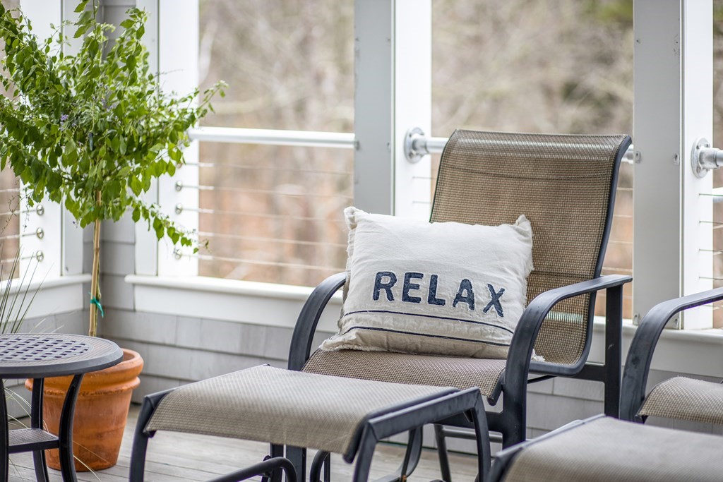 18 Snow Shore Road Orleans, MA 02653 - Photo 18 of 42 a view of a dining room with furniture window and outside view