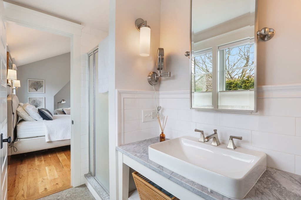 18 Snow Shore Road Orleans, MA 02653 - Photo 28 of 42 a en suite bathroom with a sink and a mirror