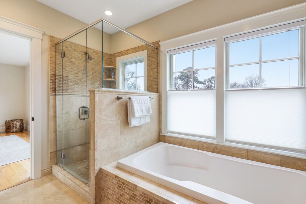 18 Snow Shore Road Orleans, MA 02653 - Photo 33 of 42 a bathroom with a bathtub and a shower