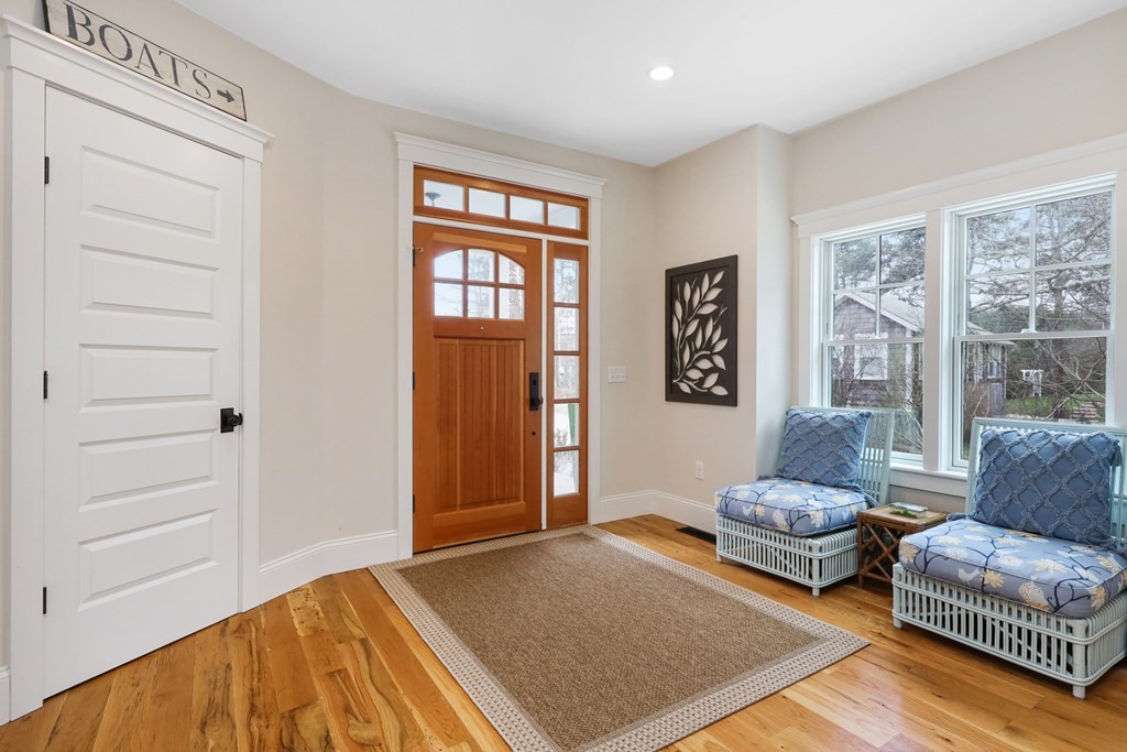 18 Snow Shore Road Orleans, MA 02653 - Photo 5 of 42 a bedroom with furniture and a rug