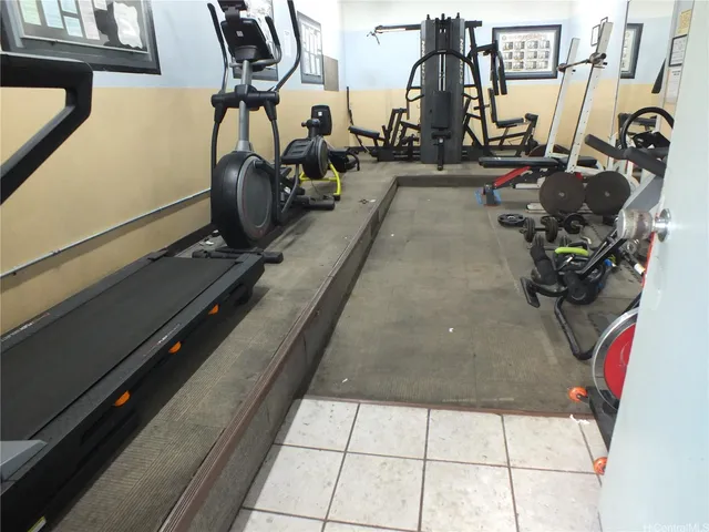 a view of a room with gym equipment
