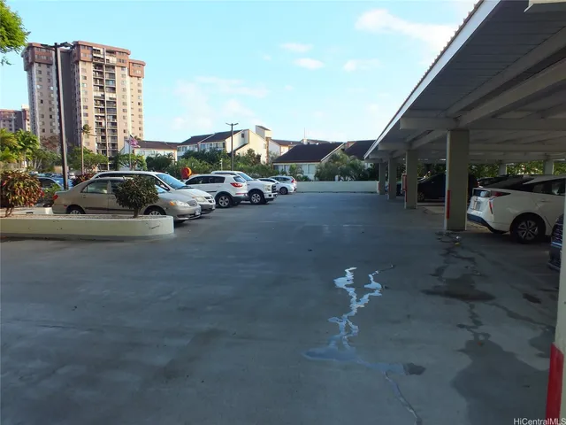 a view of a street with cars