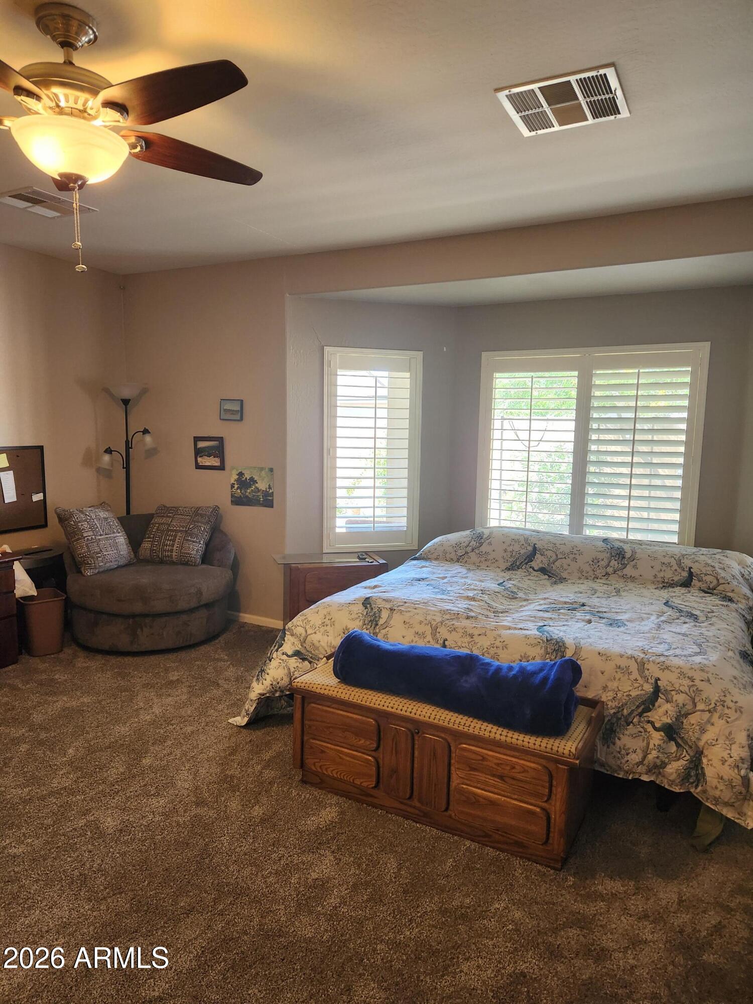 108 East Ridgeview Trail Casa Grande, AZ 85122 - Photo 13 of 38 a bedroom with bed and window