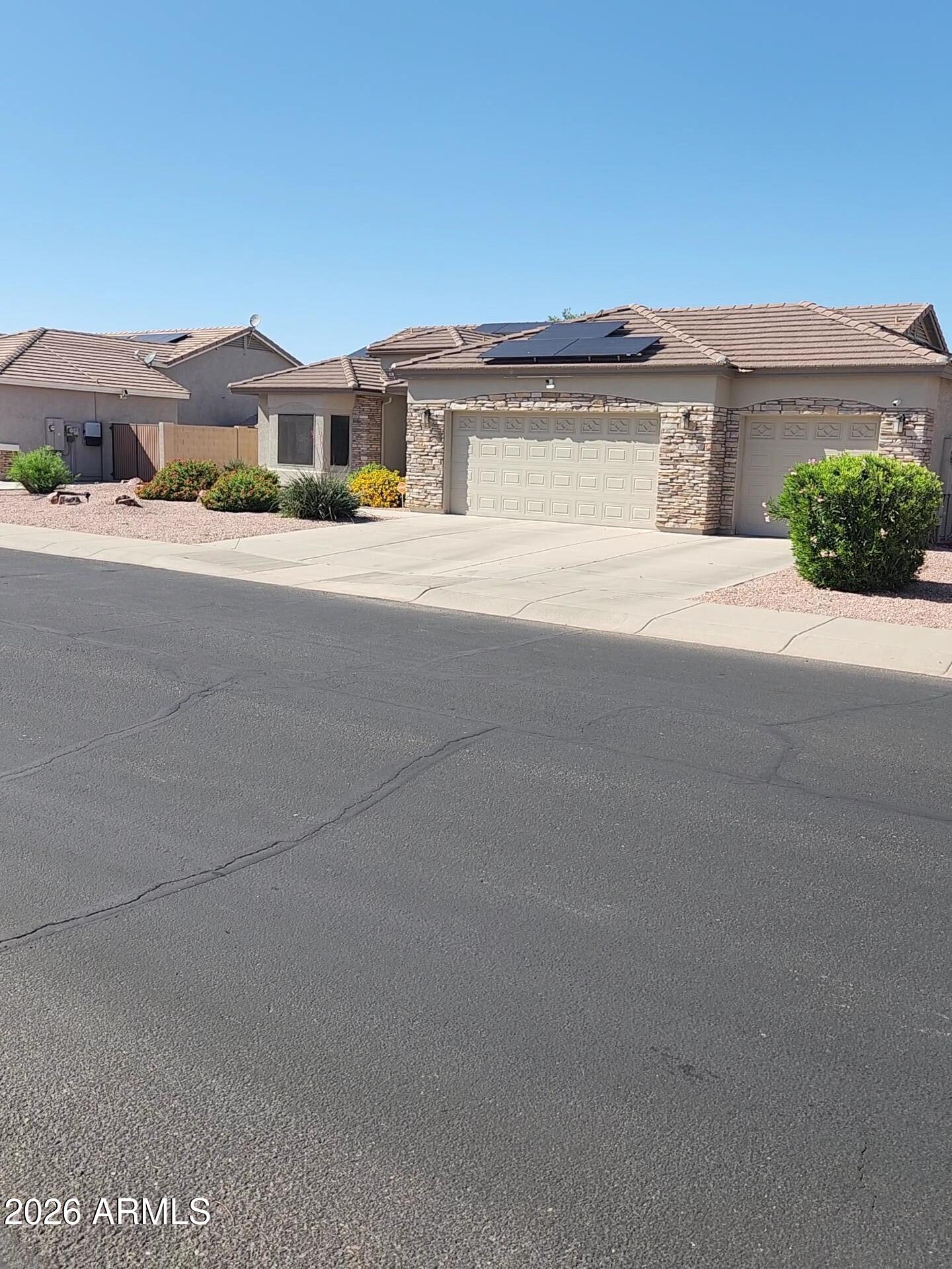 108 East Ridgeview Trail Casa Grande, AZ 85122 - Photo 29 of 38 front view of a house with a yard