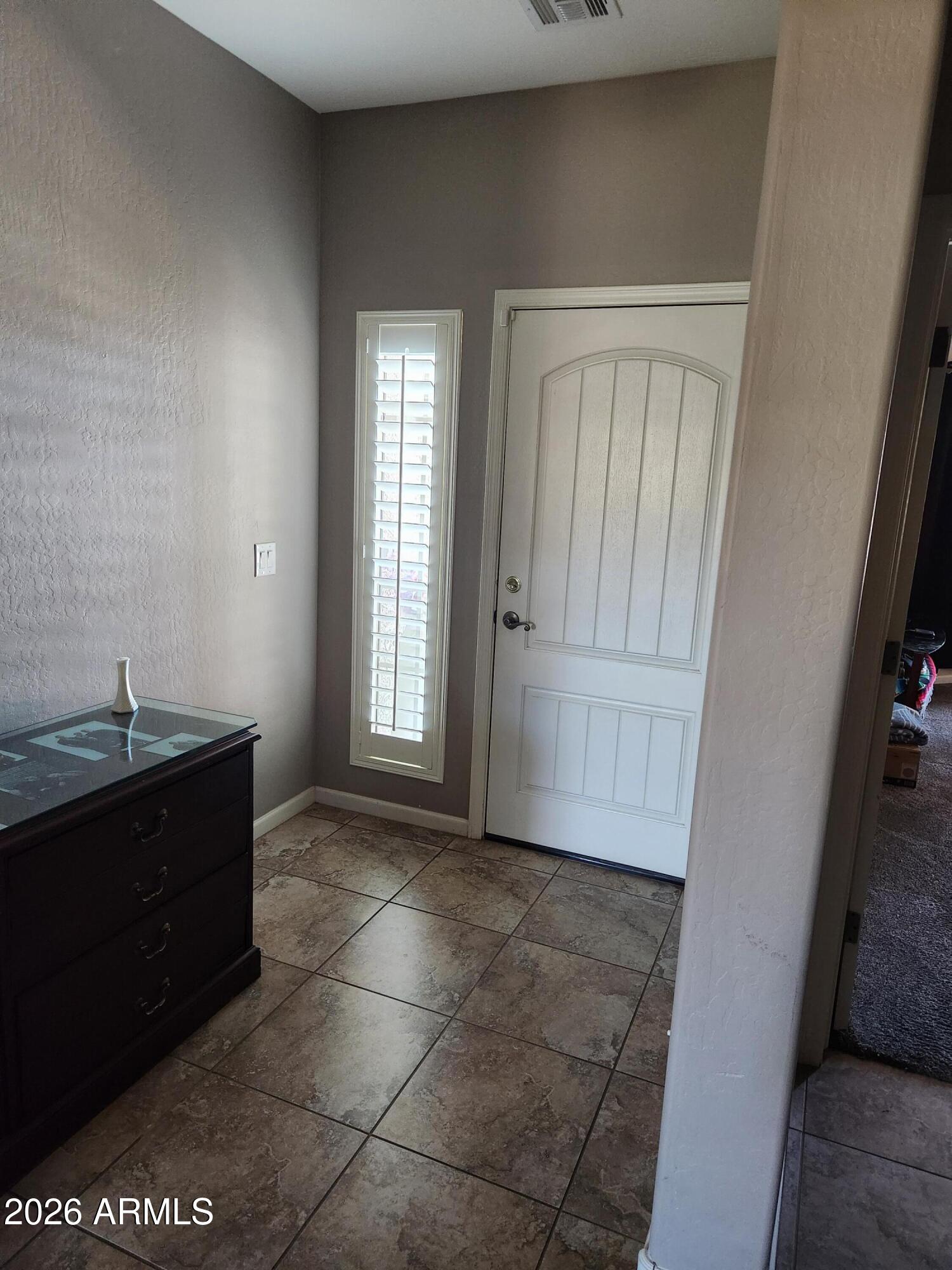 108 East Ridgeview Trail Casa Grande, AZ 85122 - Photo 8 of 38 an empty room with windows