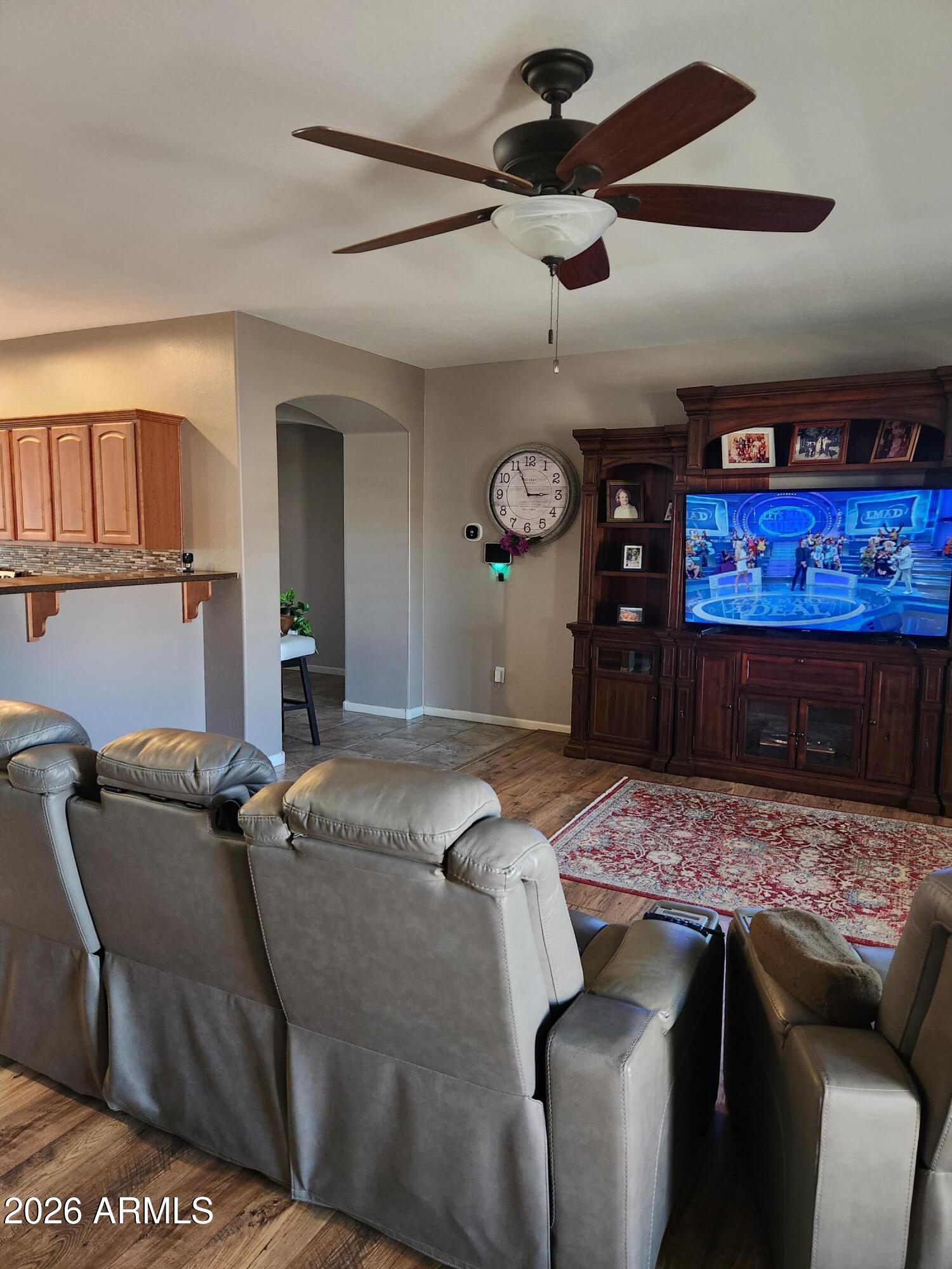 108 East Ridgeview Trail Casa Grande, AZ 85122 - Photo 10 of 38 a living room with furniture and a flat screen tv