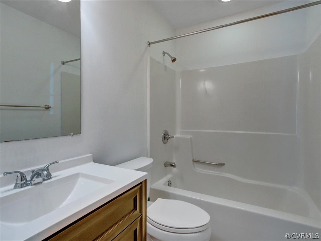 11130 Rufford Road Chester, VA 23831 - Photo 16 of 23 a bathroom with a sink a toilet and shower