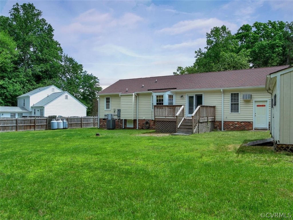 11130 Rufford Road Chester, VA 23831 - Photo 20 of 23 a front view of a house with yard and green space