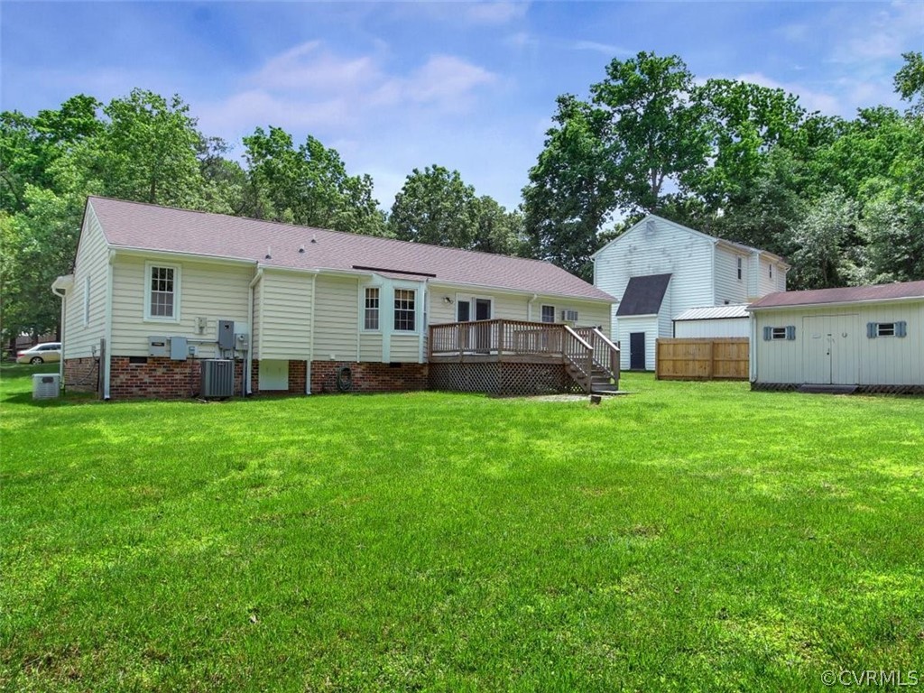 11130 Rufford Road Chester, VA 23831 - Photo 22 of 23 a view of a house with backyard and garden