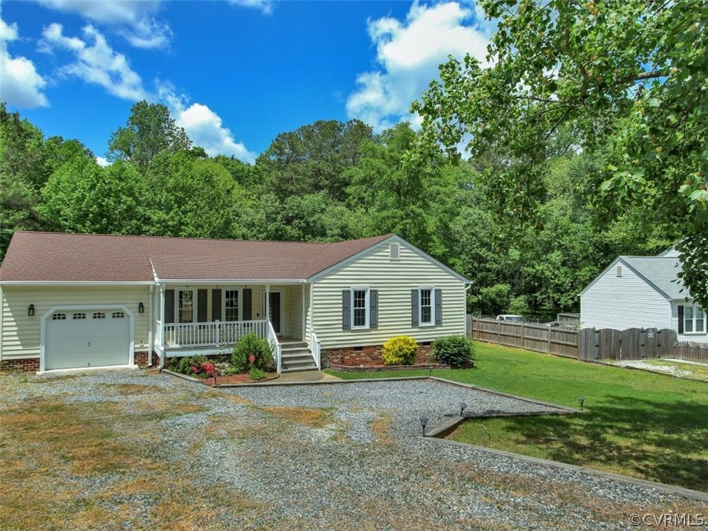 11130 Rufford Road Chester, VA 23831 - Photo 3 of 23 a front view of a house with a garden