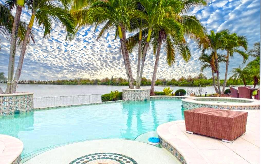 Miramar Miramar, FL 33029 - Photo 12 of 20 a view of a swimming pool and lounge chairs