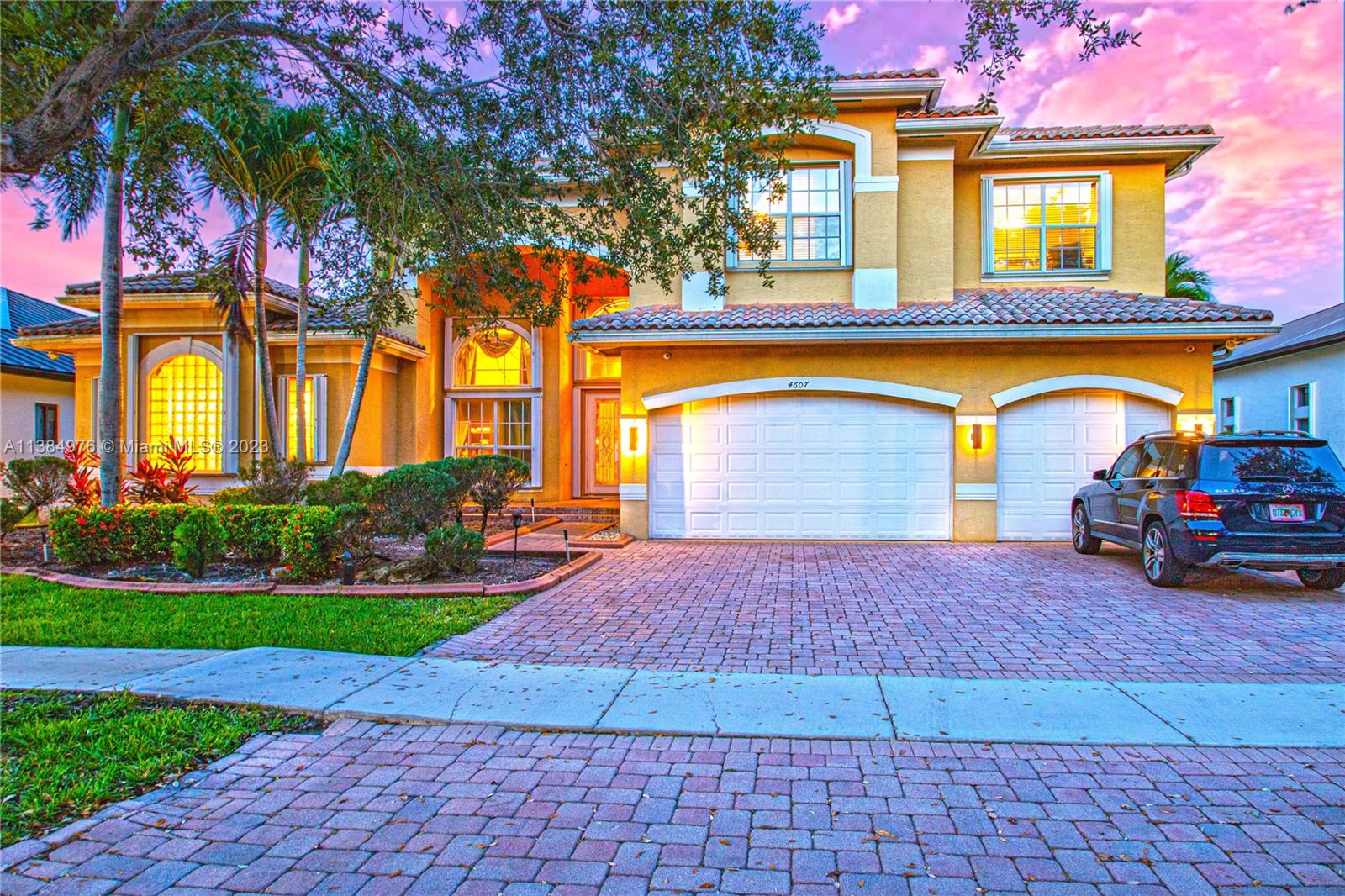 Miramar Miramar, FL 33029 - Photo 16 of 20 a view of a house with a yard and a garage