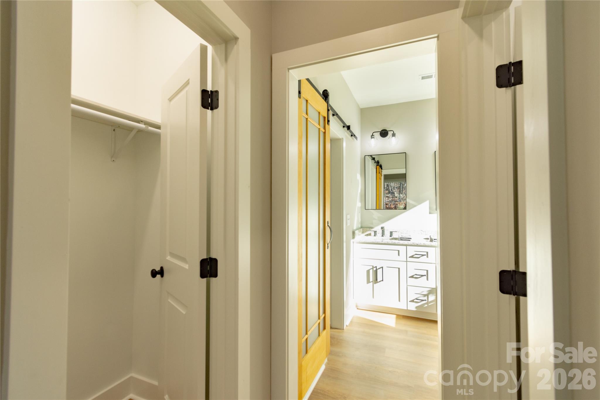 472 Oak Road Norwood, NC 28128 - Photo 19 of 27 a bathroom with a glass shower door