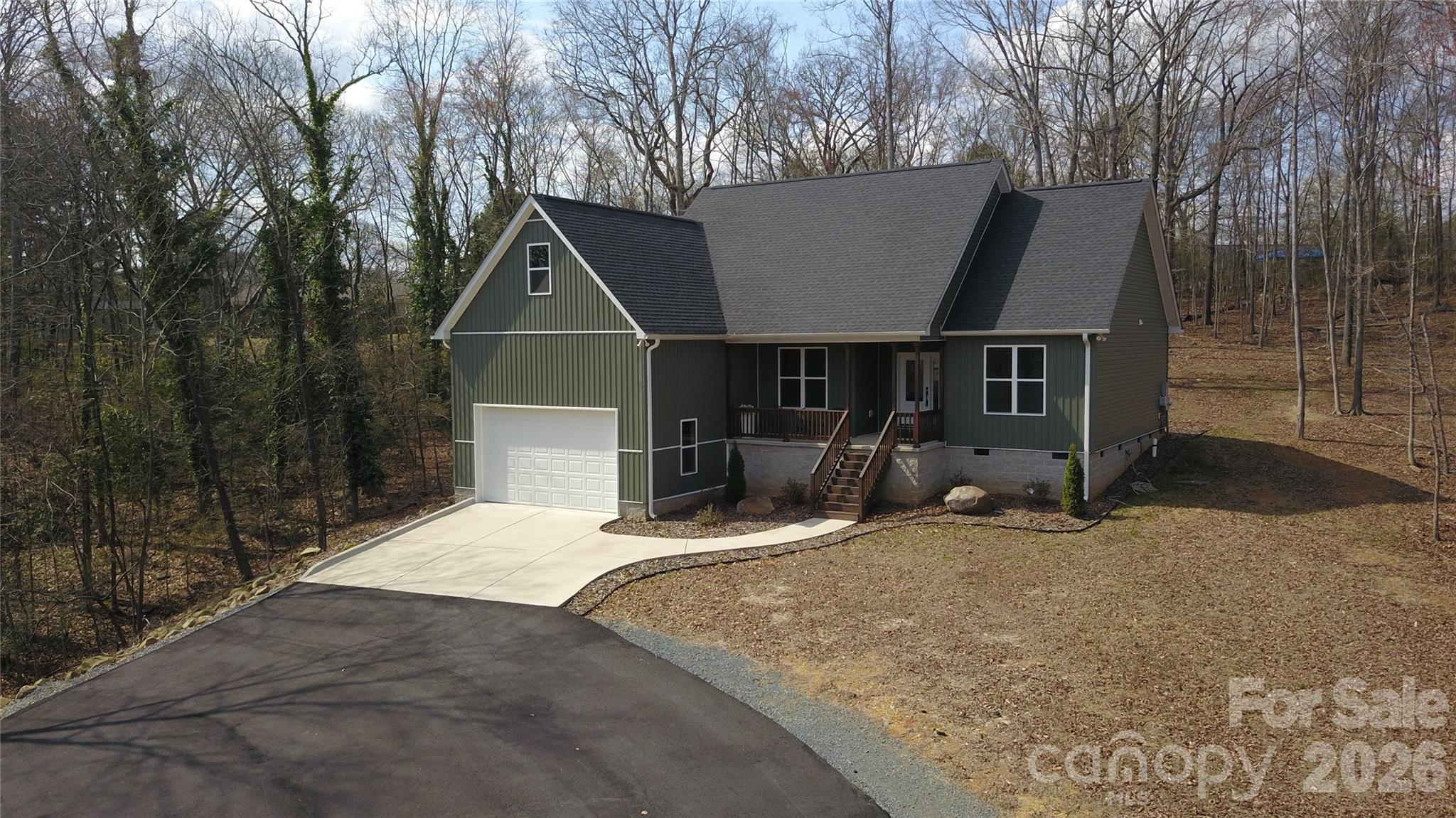 472 Oak Road Norwood, NC 28128 - Photo 2 of 27 a view of house with yard and sitting area