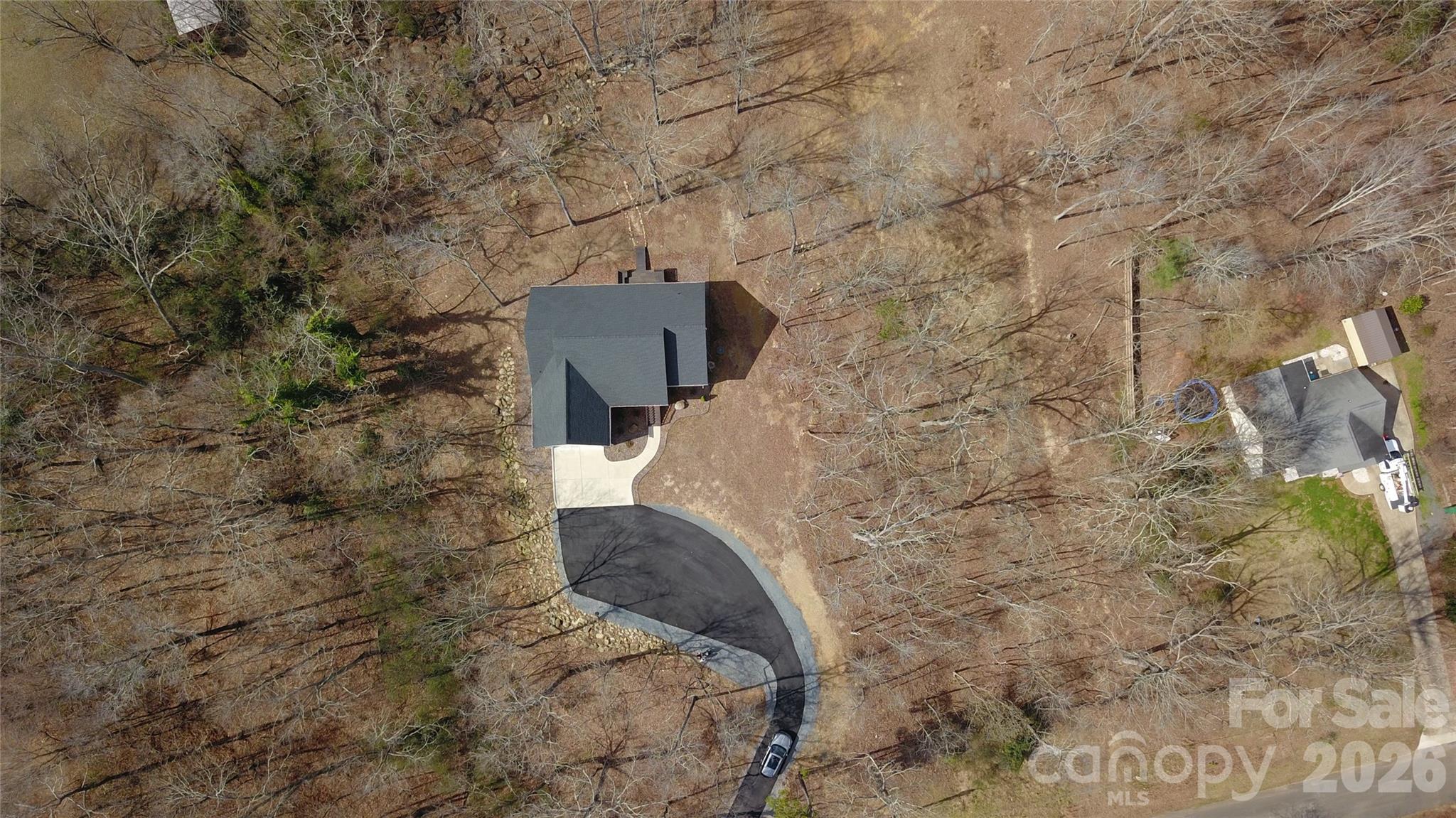 472 Oak Road Norwood, NC 28128 - Photo 25 of 27 a aerial view of a house with large trees