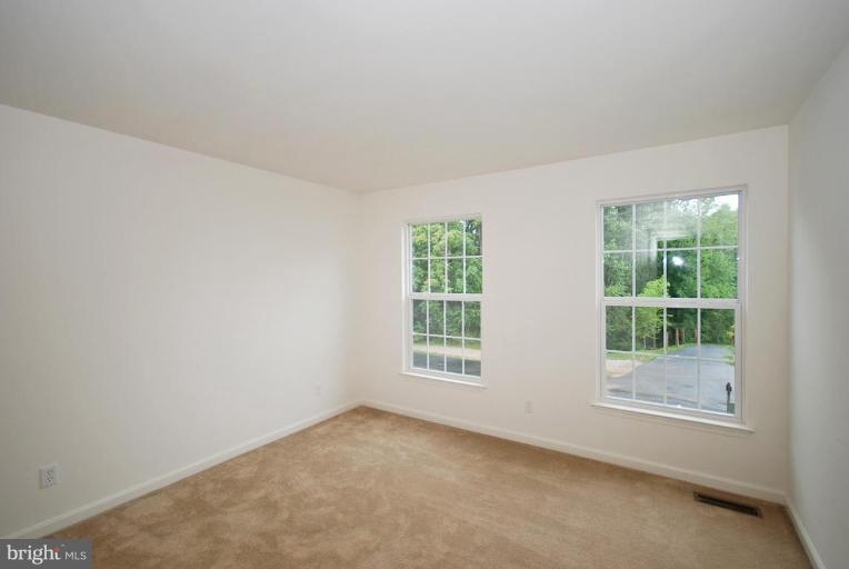 5946 Florey Road Hanover, MD 21076 - Photo 26 of 27 an empty room with windows