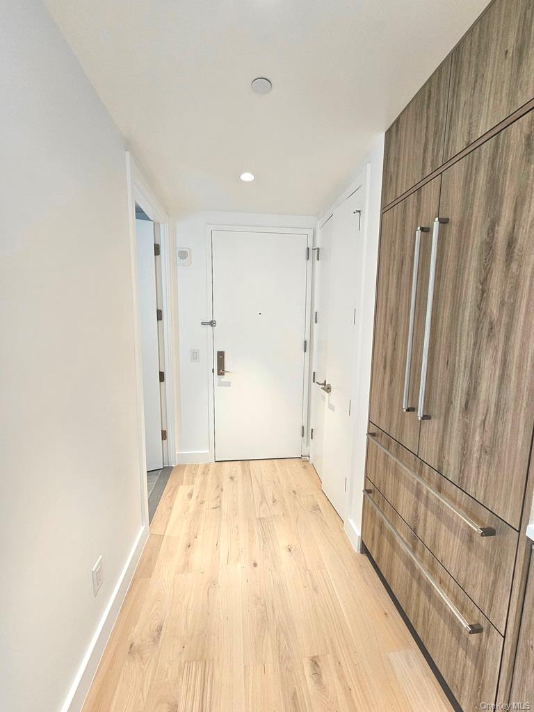 136-18 Maple Avenue, Unit 16A Queens, NY 11355 - Photo 2 of 15 a view of bathroom with bathtub and shower