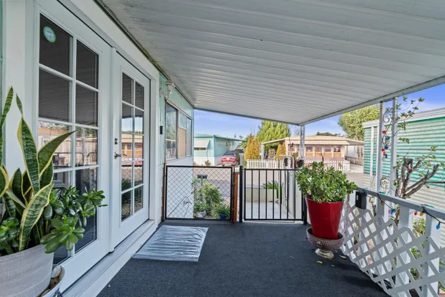 a view of a porch with furniture