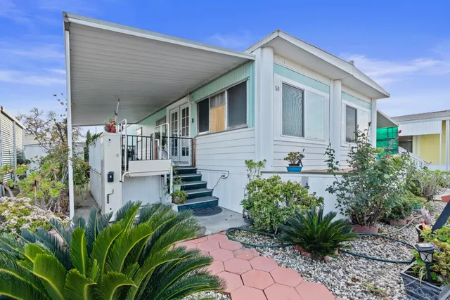 a house view with a outdoor space