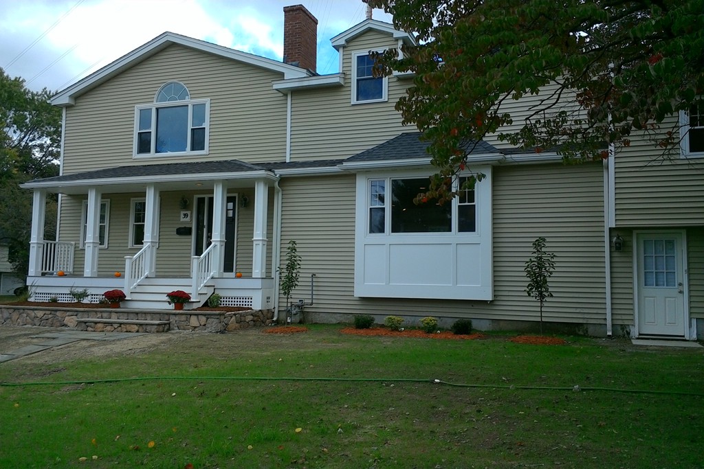 39 Dunedin Road Wellesley, MA 02481 - Photo 13 of 13 a front view of a house with yard