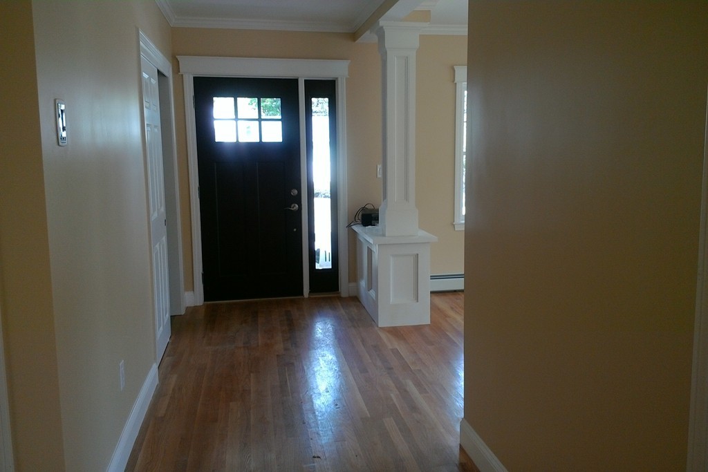 39 Dunedin Road Wellesley, MA 02481 - Photo 2 of 13 a view of a hallway with wooden floor