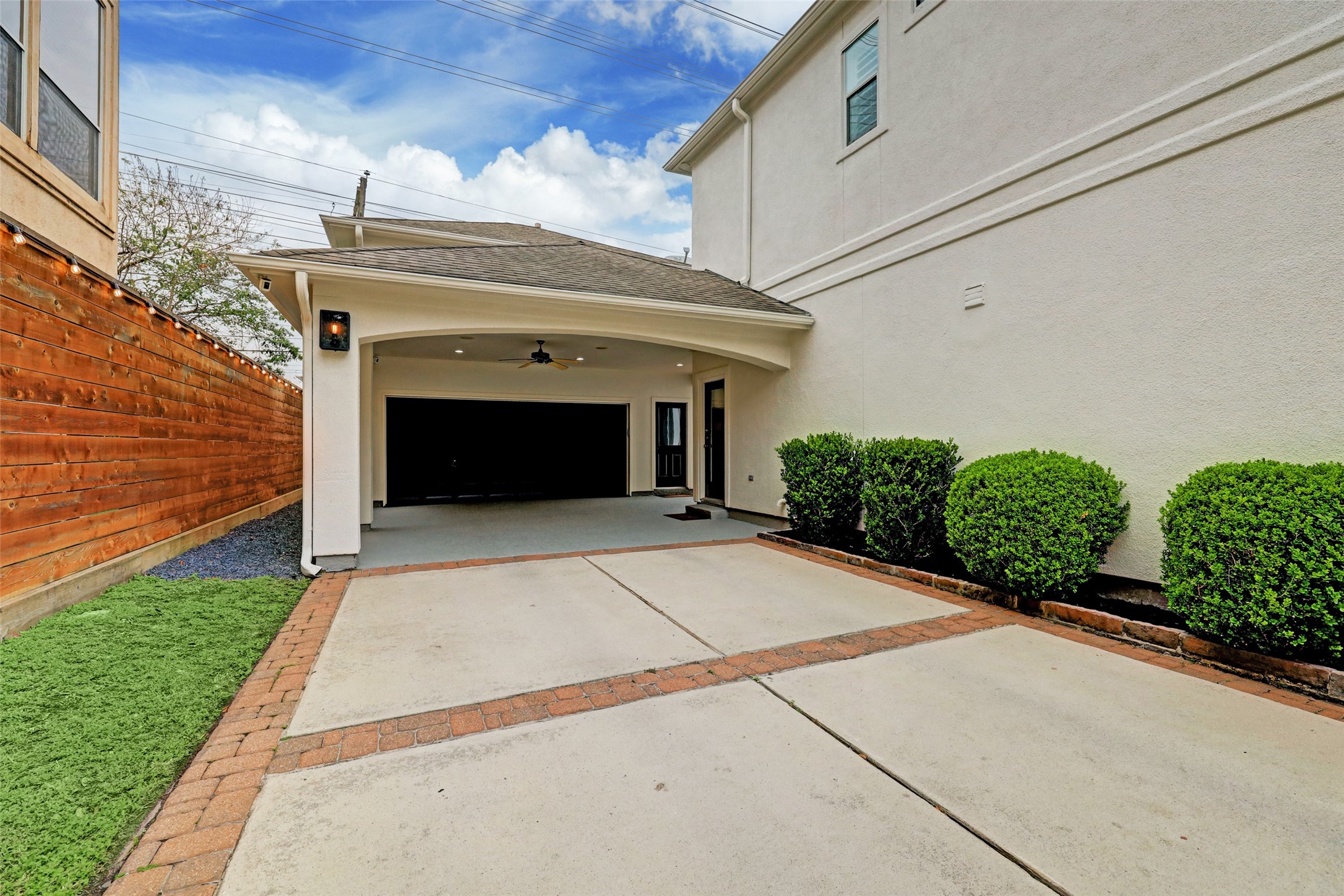 4004 Childress Street Houston, TX 77005 - Photo 3 of 34 a front view of a house with garden