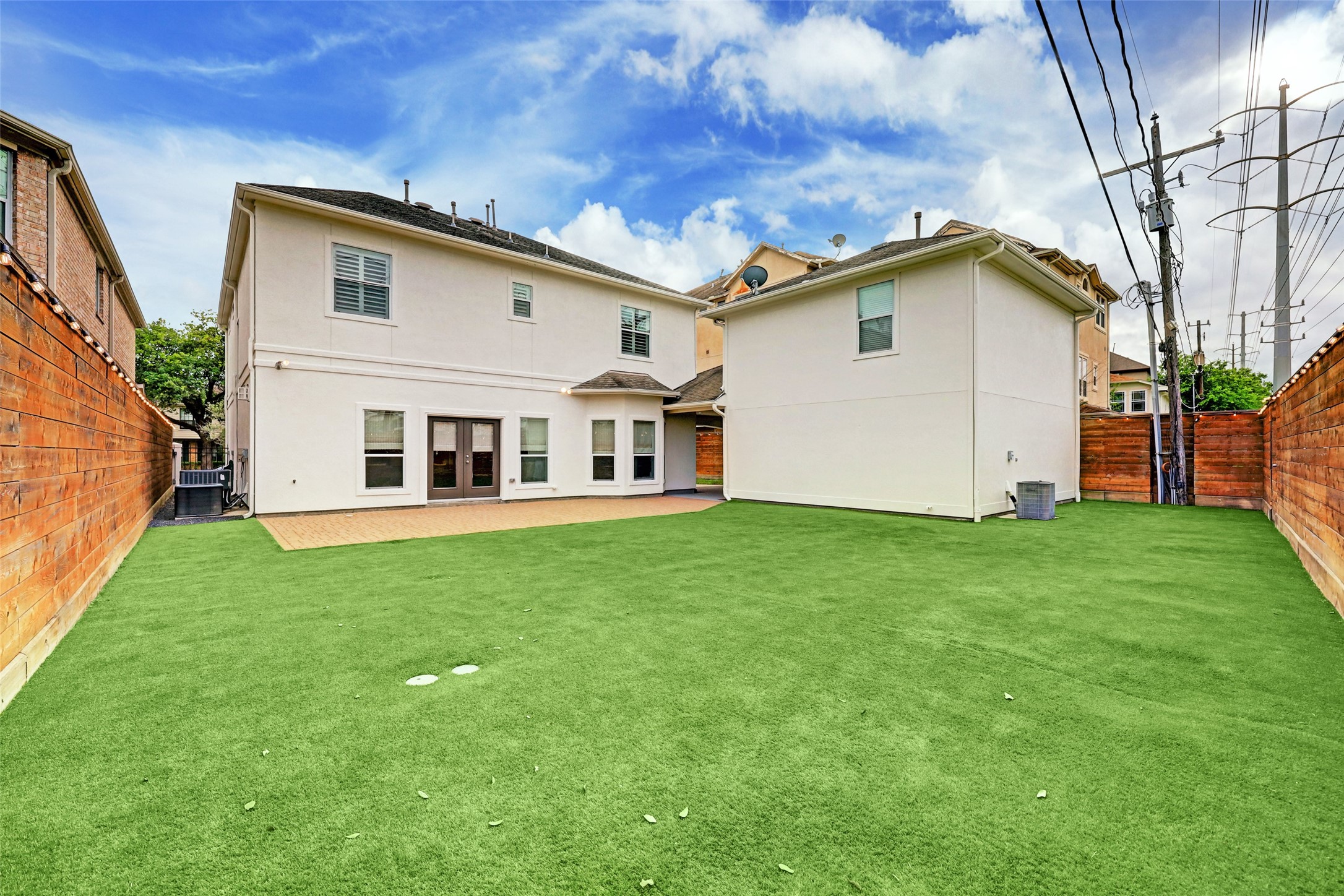 4004 Childress Street Houston, TX 77005 - Photo 33 of 34 a view of a backyard with plants and a garden