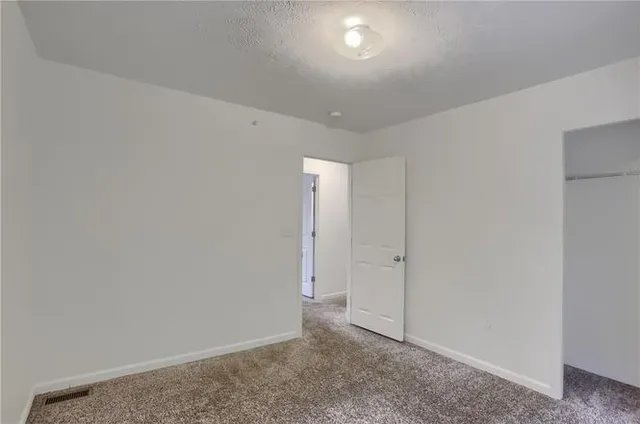 an empty room with an entryway