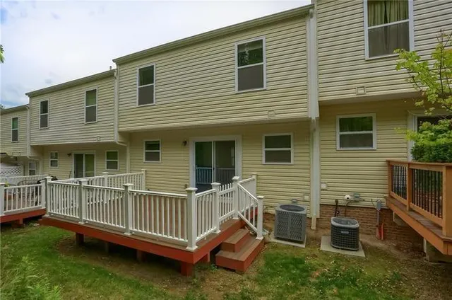 a view of a house with a deck