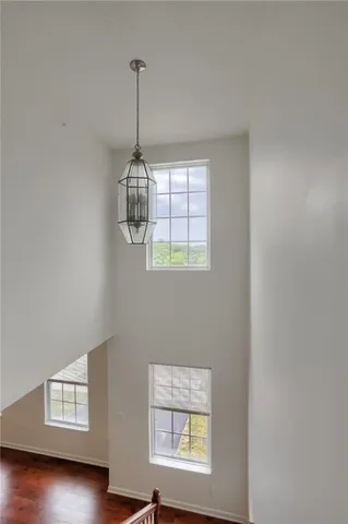 a room with window and ceiling fan