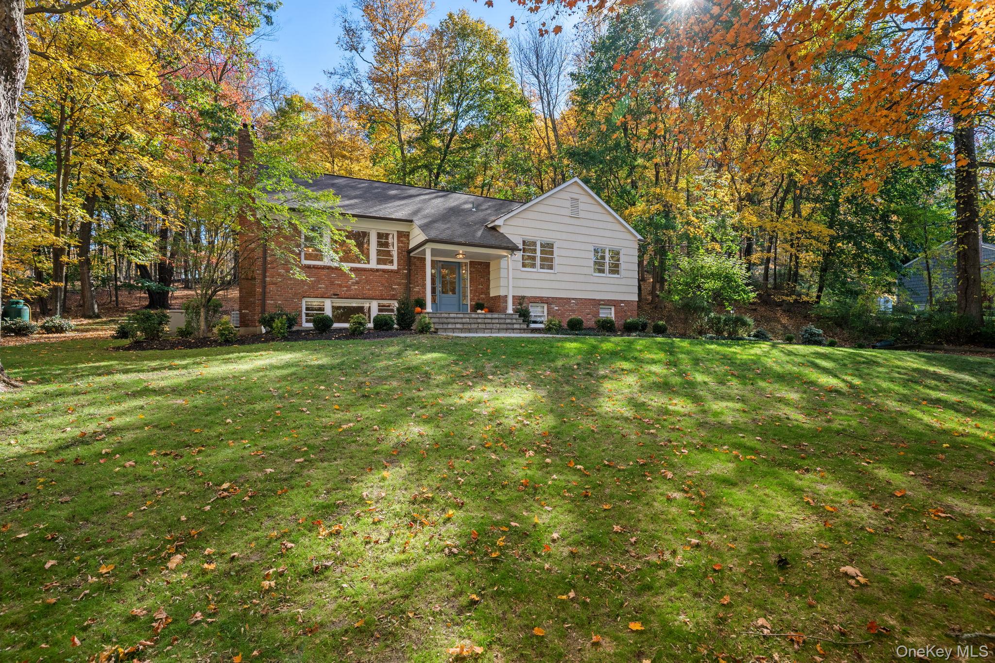 Welcome to 341 Millwood Road in Chappaqua. Thoughtfully renovated and set on a picturesque property framed by mature foliage, this home offers refined updates, inviting spaces, and a tranquil sense of privacy just moments from town.