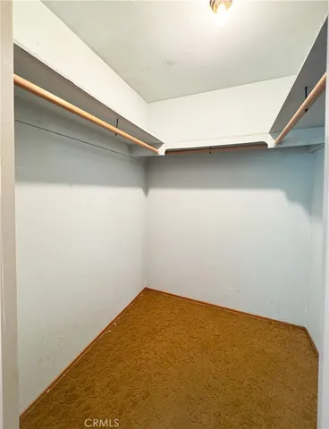 a view of a room with rack on the wall