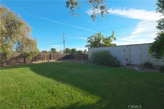 a view of a house with a big yard