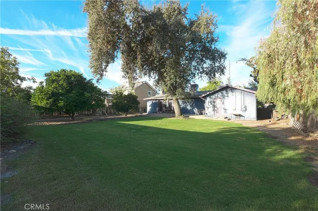 a backyard of a house with seating space