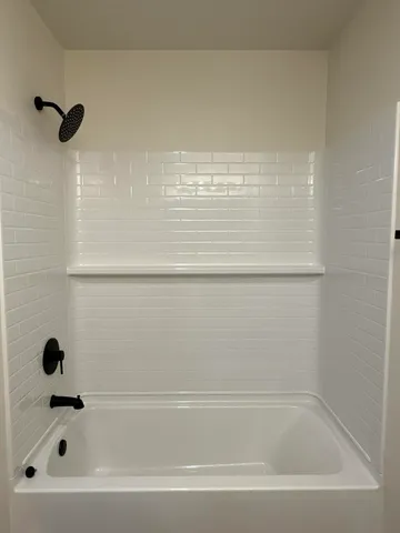 a view of a room that has a window in it