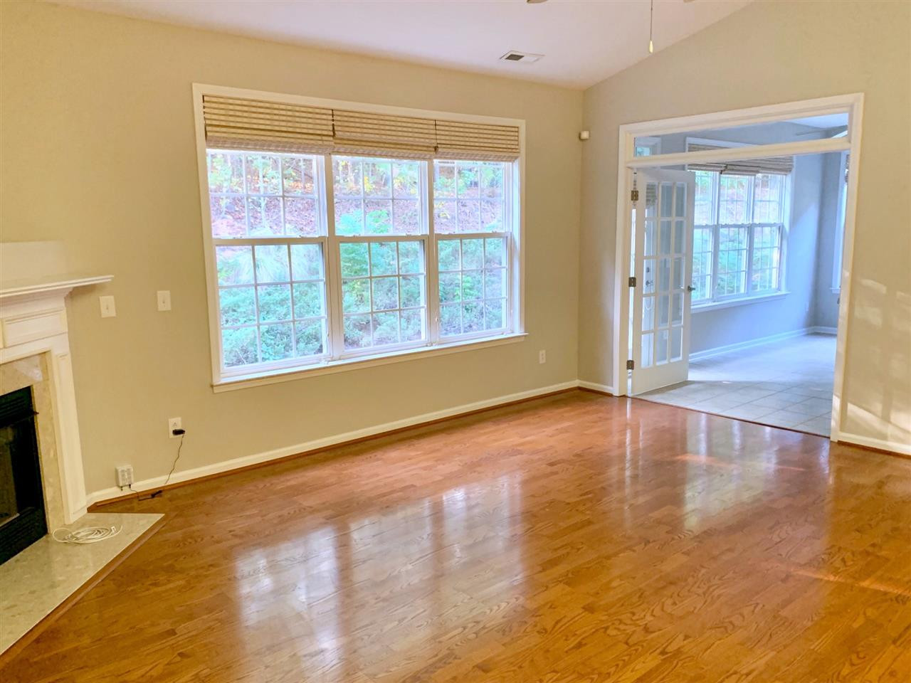 10445 Blue Dun Way Raleigh, NC 27614 - Photo 10 of 28 View from family into sunroom
