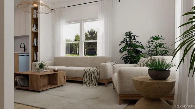 a living room with furniture potted plant and a window
