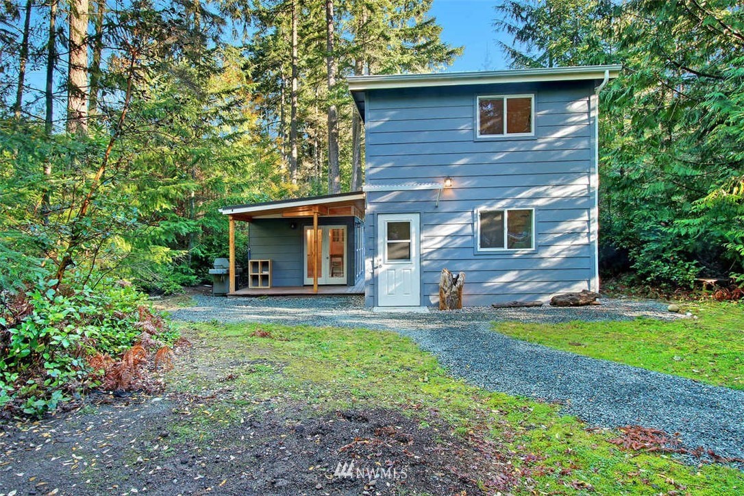 6615 Cultus Bay Road Clinton, WA 98236 - Photo 25 of 25 a view of a house with a yard