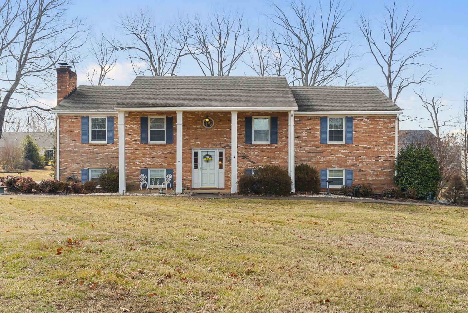 front view of a house with a yard