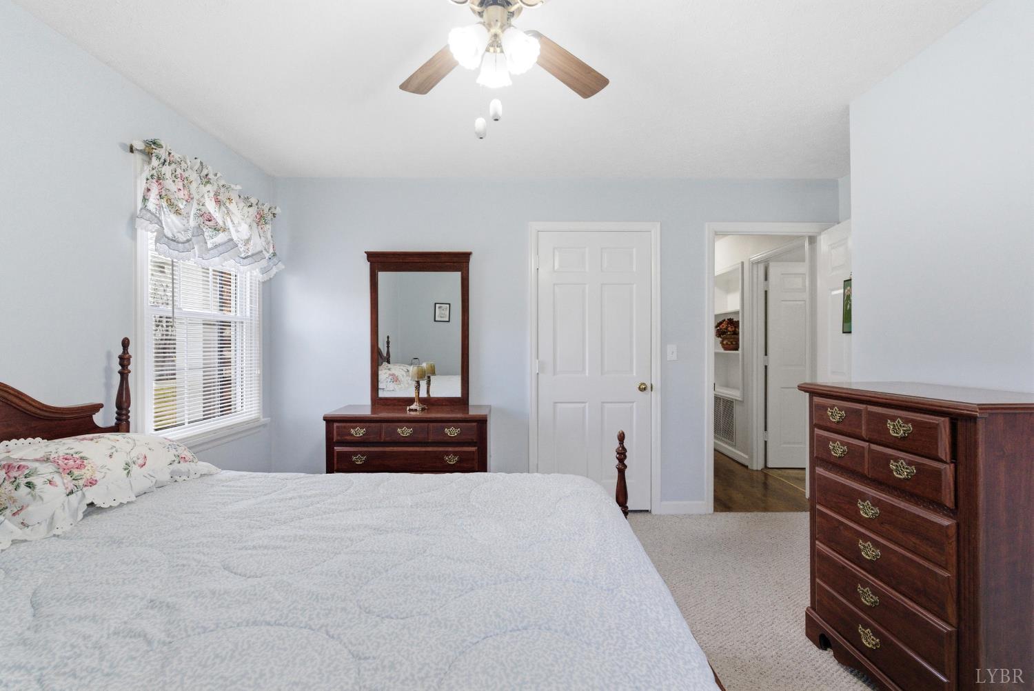 14 Sleepy Hollow Road Lynchburg, VA 24502 - Photo 19 of 35 a bedroom with a bed and a dresser