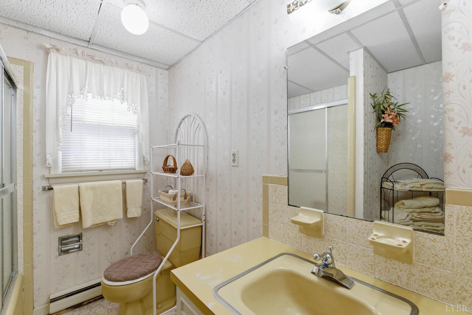 14 Sleepy Hollow Road Lynchburg, VA 24502 - Photo 24 of 35 a bathroom with a sink and a mirror