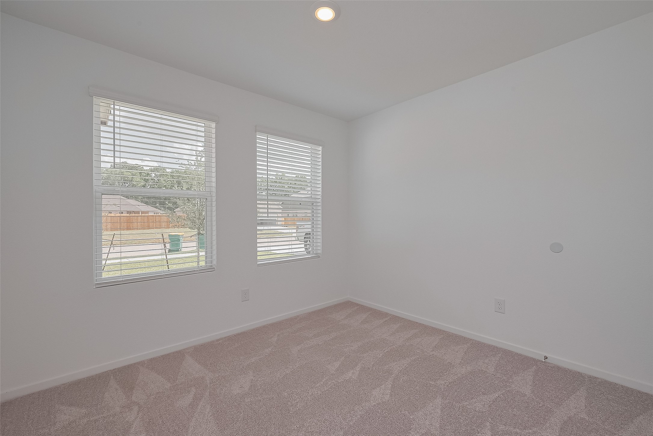 21459 Montecagnano Avenue New Caney, TX 77357 - Photo 16 of 27 an empty room with a window
