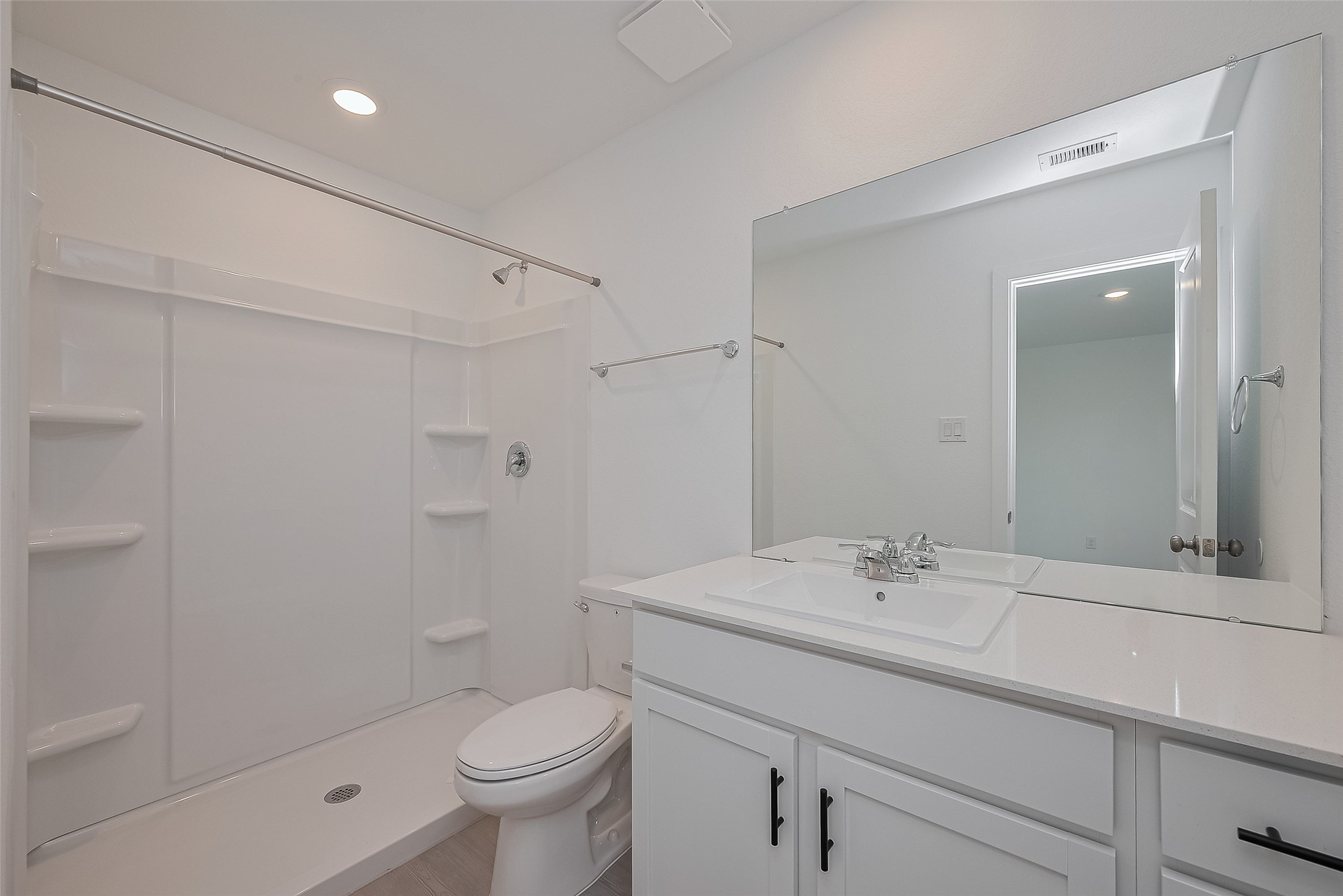 21459 Montecagnano Avenue New Caney, TX 77357 - Photo 22 of 27 a bathroom with a sink toilet and shower