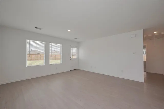 an empty room with a window