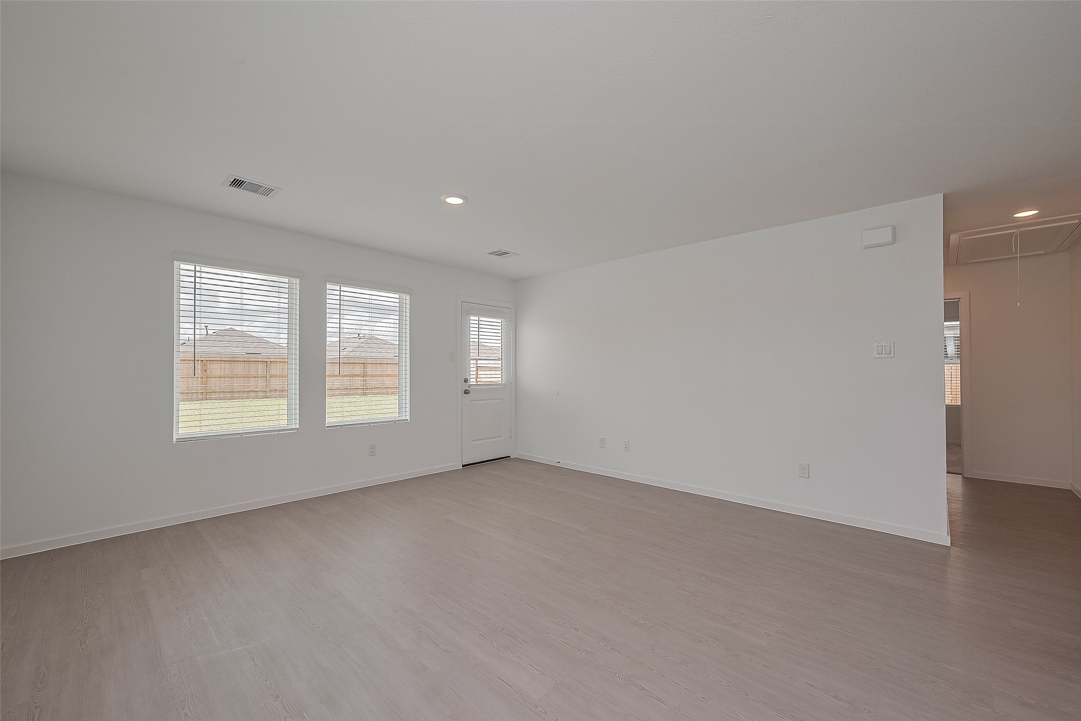 21459 Montecagnano Avenue New Caney, TX 77357 - Photo 10 of 27 an empty room with a window